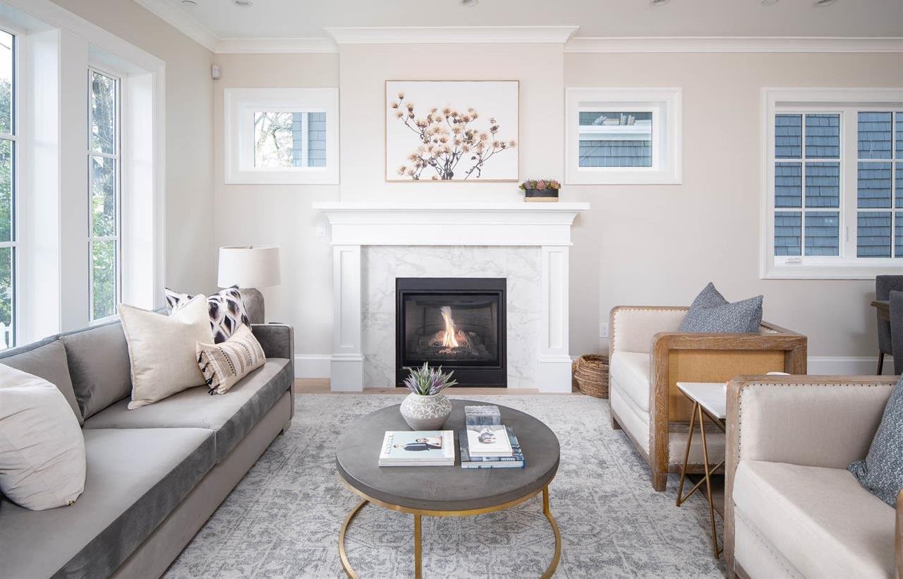 Beautiful classic french country inspired fireplace and living area with bay window